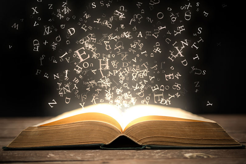 lettere che escono fuori da un libro