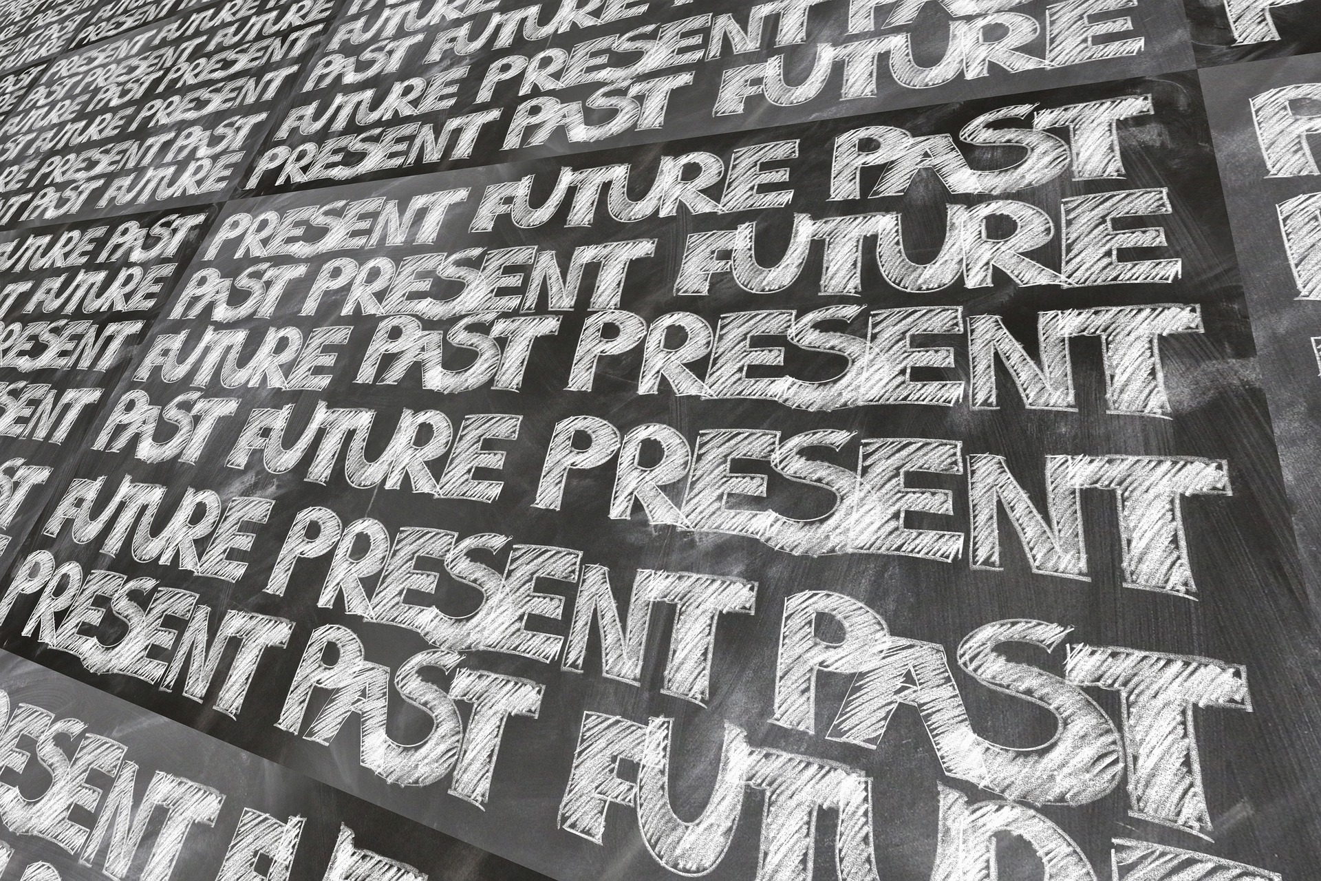 Lavagna con scritta future, present, past