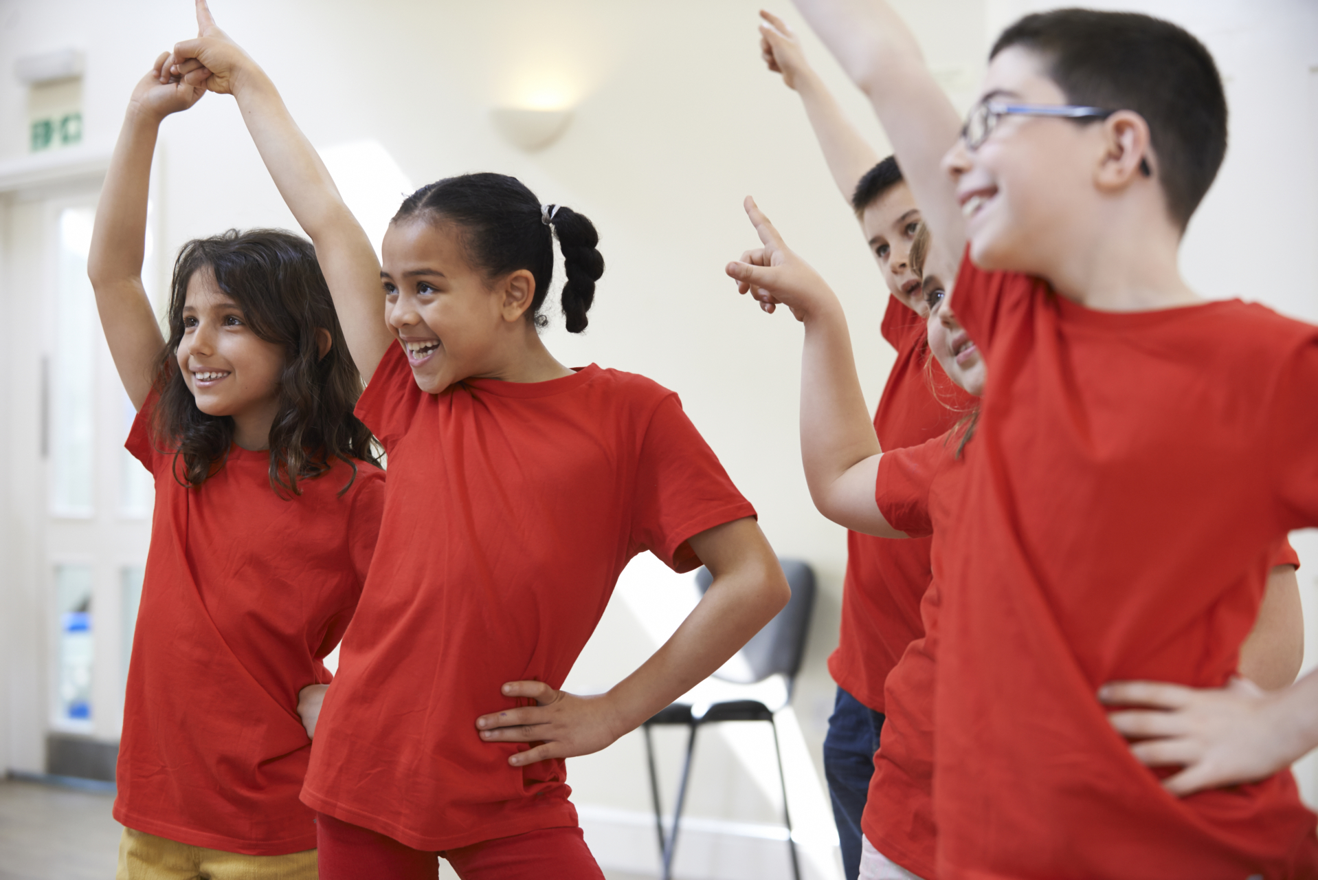 Drama in English Language Teaching – Getting Students Ready Group Of Children Enjoying Drama Class Together